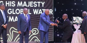 His Majesty King Letsie III of Lesotho receives the Presidential Global Water-maker Award as Prime Minister Russell Mmiso Dlamini of Eswatini looks on during the national celebration in Maseru.