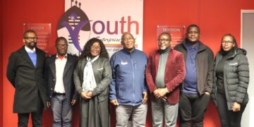 YERF CEO Mandla Nkambule (centre) and World Vision Eswatini National Director Amos Zaindi (third from right) with executives from both organisations after their strategic meeting to strengthen youth enterprise development in Eswatini. Photo by World Vision Eswatini