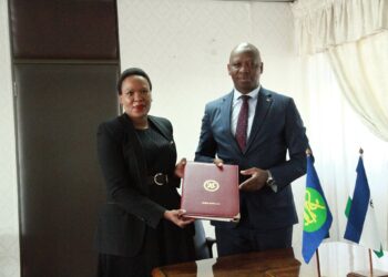 Minister of Foreign Affairs and International Relations Lejone Mpotjoane with a SADC official after signing the two regional protocols in Maseru.