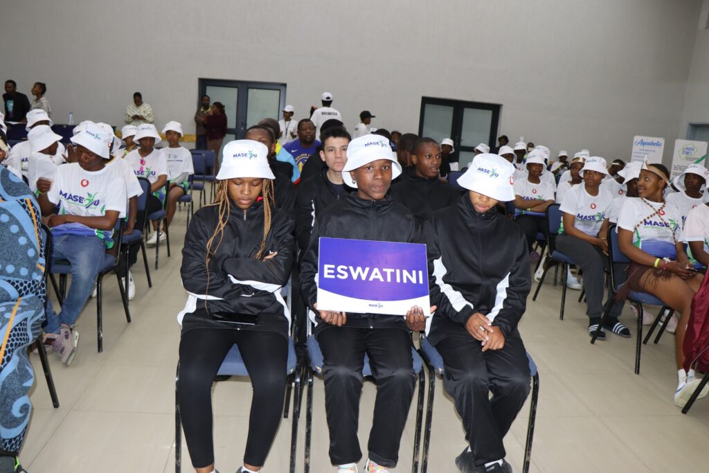 Delegates from Eswatini attending the Maseru Youth Games observe the ceremony and engage with young athletes. Photo by Lesotho Ministry of Tourism, Sports, Arts and Culture