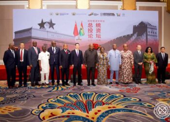 President John Dramani Mahama poses with Chinese and Ghanaian officials during the Presidential Investment Forum in Beijing.
