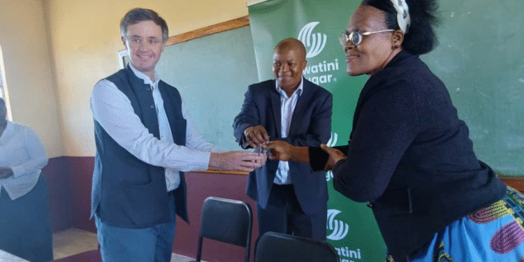 ED & F Man Sugar CEO Daniel Polok, ESA CEO Banele Nyamane handing over the classrooms keys to Dlalisile Primary School Headteacher Maria Simelane. | Pic, Xolani Mngomezulu