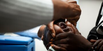 An infant receives a measles-rubella vaccine during the national campaign at Lorreto Clinic in Maseru, Lesotho. Photo by WHO Lesotho