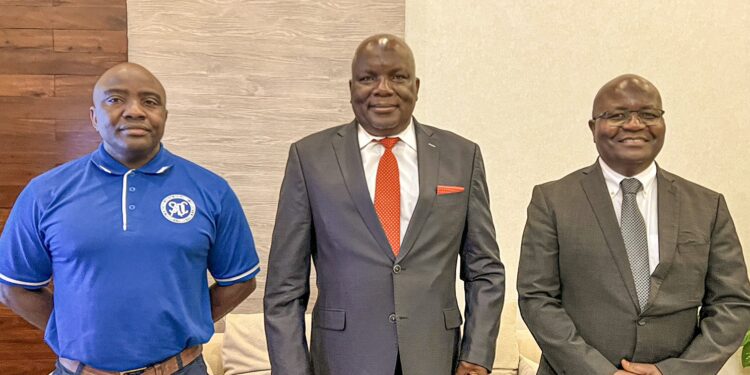 Honourable Richard Msowoya pictured with two fellow SADC election observers during the preparatory training in Dar es Salaam. Photo by SADC
