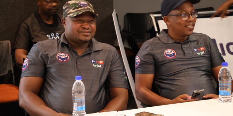 SNAT Secretary General Lot Vilakati and SNAT President Mbongwa Dlamini pictured at the E300 000 sponsorship handover from Pick n Pay. The sponsorship has fomented the feud between SNAT and TUCOSWA. | Pic; The SNAT Platform