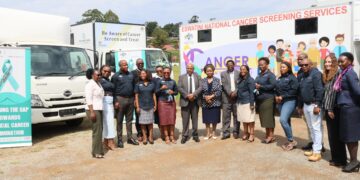 Minister Mduduzi Matsebula poses with health officials and staff at the launch of the four mobile cancer screening clinics in Eswatini. (Photo by Ministry of Health, Eswatini)