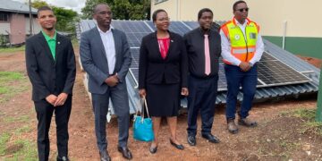 Officials from the Ministry of Labour and Social Security and ESERA pose with Solar Photovoltaic equipment during the handover ceremony at DIVT.