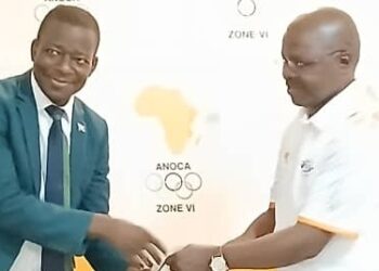Minister for Sports, Culture and Youth Affairs receiving i gift from ANOCA ZONE VI president, Col. Botsang Tshenyego. | Pic, Lindelwa Myeni