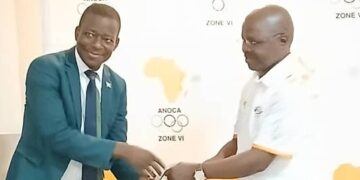 Minister for Sports, Culture and Youth Affairs receiving i gift from ANOCA ZONE VI president, Col. Botsang Tshenyego. | Pic, Lindelwa Myeni