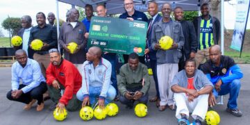 RES Managing Director Nick Jackson has a photo opportunity with some participants at the event. | Pic, Eswatini Soccer Diski