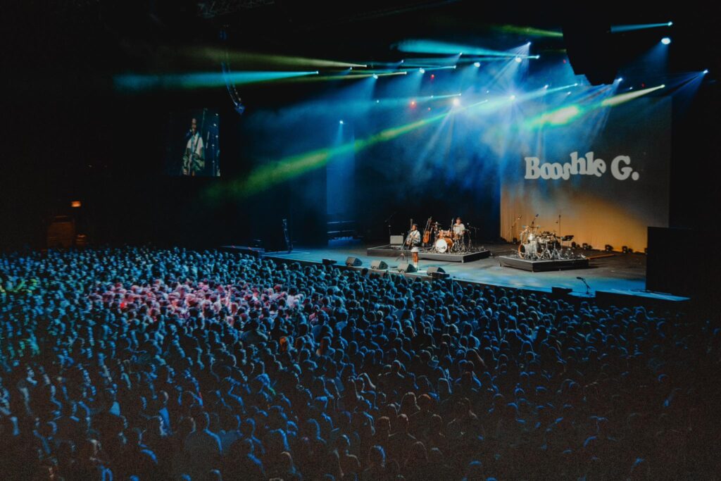 Booshle G electrifies the crowd with his signature folk-pop sound during a live performance. Photo credit: Booshle G Facebook