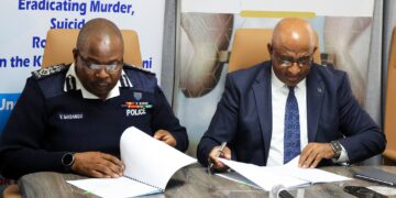 National Commissioner Manoma Vusie Masango and Central Bank Governor Dr. Phil Mnisi sign a landmark MoU to strengthen security collaboration between REPS and CBE. Photo by REPS