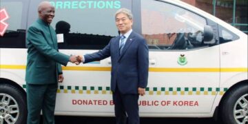 Minister of Justice Prince Simelane receives the ambulances from the Republic of Korea