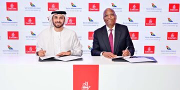Adnan Kazim, Emirates’ Deputy President and Chief Commercial Officer, and Professor M. John Lamola, Group Chief Executive Officer of South African Airways, sign the expanded codeshare agreement at the 2025 Dubai Airshow. Photo by FlySAA