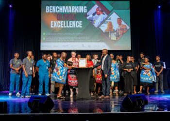ICT Ministry officials with representatives from The Luke Commission and Luvelo at the celebration of their global achievements.