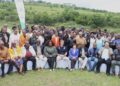 Stakeholders gathered at the Lusushwana River to see progress made in removing alien invasive plants. UNDP