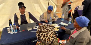 Healthcare workers attending to the elderly during the event at Marlkerns Research Station. Photo by TAVI.