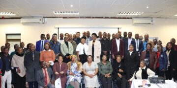 Stakeholders and officials pose for a group photo at the KEAS Annual Research Conference. Photo by Ministry of ICT