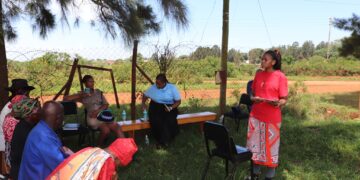 Ministry of Information, Communications and Technology instructor demonstrates digital tools to Lomahasha residents during the outreach programme.