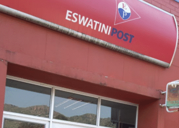 Eswatini Post logo displayed on the exterior of one of its post office buildings.