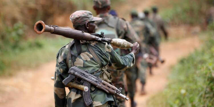 Democratic Republic of Congo military personnel (FARDC) patrol against the Allied Democratic Forces (ADF) and the National Army for the Liberation of Uganda (NALU) rebels near Beni in North-Kivu province, December 31, 2013. REUTERS/Kenny Katombe/File Ph