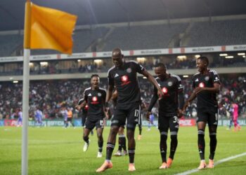 Pirates players celebrate Makgopa’s late goal that sealed the 2-0 win over Chippa United at Orlando Stadium.