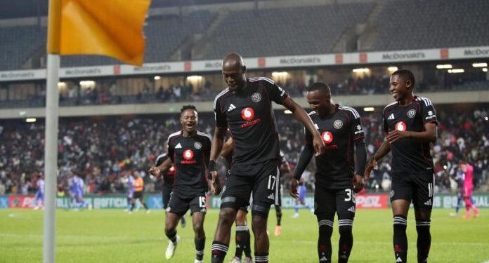 Pirates players celebrate Makgopa’s late goal that sealed the 2-0 win over Chippa United at Orlando Stadium.