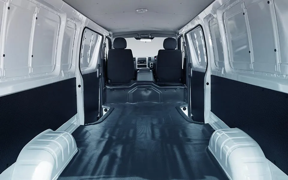 Spacious and ergonomic cabin designed for driver comfort with easy access to controls and storage.