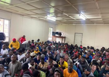 A joint JMPD, SAPS, and Home Affairs operation in Mayfair led to the arrest of 217 women and over 400 men for immigration violations. Immigration officials are processing the individuals according to legal protocols. Photo by X/@PublicSafetyMMC
