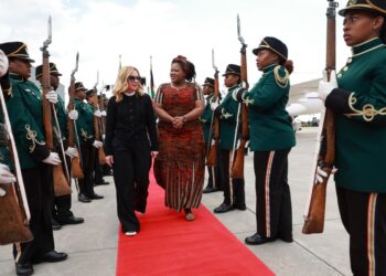 President Giorgia Meloni of Italy walks through a guard of honour upon her arrival at Fireblade Aviation for the G20 Leaders’ Summit in South Africa. Photo by X/@g20org