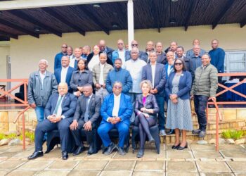 Ministry of Agriculture Sydney Simelane has a photo opportunity with National Drought Plan review attendees. Pic, InsideBiz