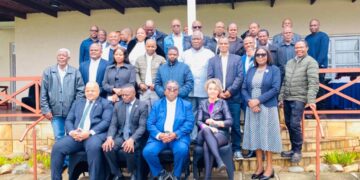 Ministry of Agriculture Sydney Simelane has a photo opportunity with National Drought Plan review attendees. Pic, InsideBiz
