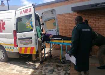 Convicted Pastor Bongi Phiri is loaded into an ambulance outside the High Court after his sudden collapse in the courtroom, following a five-year no-fine sentence for assaulting an 11-year-old girl. Photo by Sithembiso Sihlongonyane