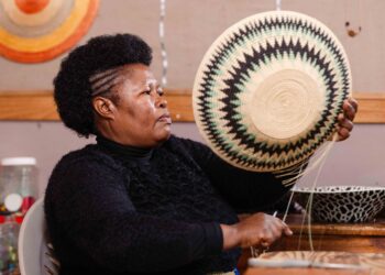 A Swazi artisan weaves a traditional basket, preserving Eswatini’s rich craft heritage. Photo by ITC
