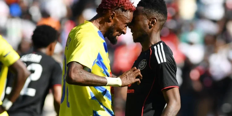 Dieumerci Mukoko Amale attempts to headbutt Orlando Pirates player Masindi Nemtajela during their CAF Champions League match in October 2025. Photo credit: Backpage