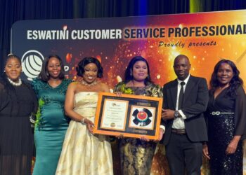 Minister of ICT Savannah Maziya receives the Innovation of the Year award alongside members of her team during the 10th Eswatini Customer Service Excellence Awards held on Friday evening. Photo: Ministry of ICT