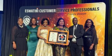 Minister of ICT Savannah Maziya receives the Innovation of the Year award alongside members of her team during the 10th Eswatini Customer Service Excellence Awards held on Friday evening. Photo: Ministry of ICT