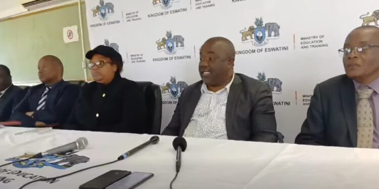 Minister of Education and Training Owen Nxumalo with officials during the press conference.