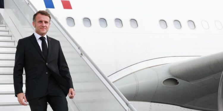 French President Emmanuel Macron disembarks from the plane upon his arrival at OR Tambo International Airport in Johannesburg. Photo by X/@PresidencyZA.