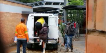 People who appeared at the Mbabane Magistrates Court for offences getting into a police van. | Photo, Sithembiso Sihlongonyane