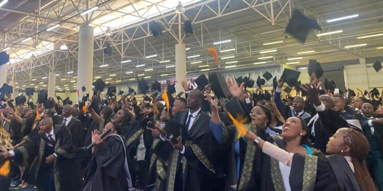 Graduates throwing their hats off during the graduation ceremony. (Pics, Sebenzile Bhembe)