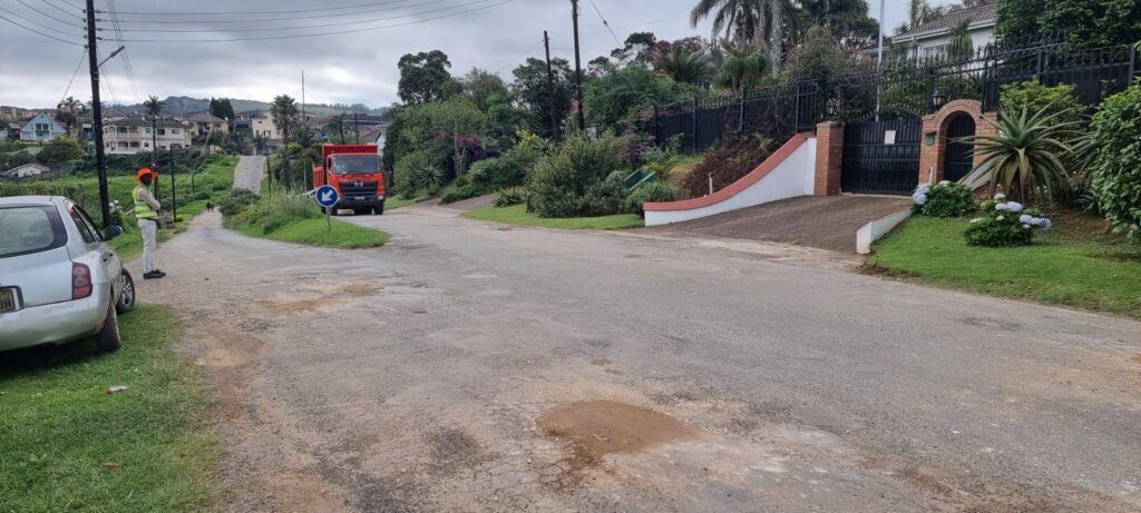 A construction truck seen on Lukhozi Street in Thembelihle, delivering materials for road repairs. Photo by Adekunle Owolabi.