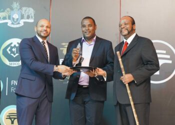 Duncan Dlamini, EYA 2025 winner, has photo opportunity with His Majesty King Mswati III.