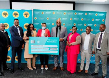 The management of FNB Eswatini and SOS Children's Villages during the handover.