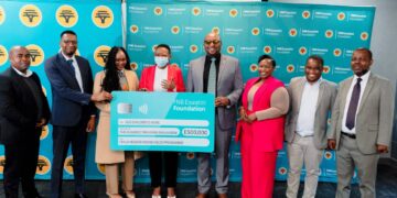 The management of FNB Eswatini and SOS Children's Villages during the handover.