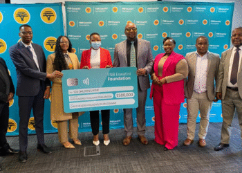 FNB Eswatini management with SOS Children's Villages Eswatini director Andile Phindile Nhleko-Makama.