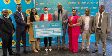 FNB Eswatini management with SOS Children's Villages Eswatini director Andile Phindile Nhleko-Makama.