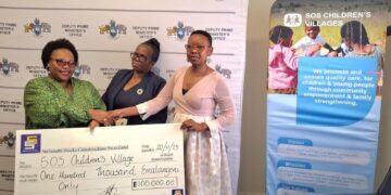 SOS Children's Villages Eswatini Director Andile Phindile Nhleko-Makama recieving the donation.