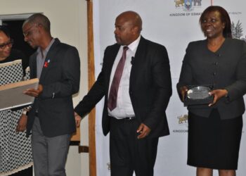 Minister of Health Mduduzi Matsebula and WHO Country Representaative Susan Tembo.