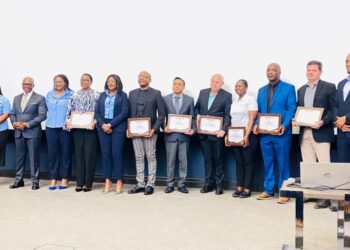 ERS Commissioner General Brightwell Nkambule with the companies after accreditation. Photos, Samkelisiwe Mavimbela